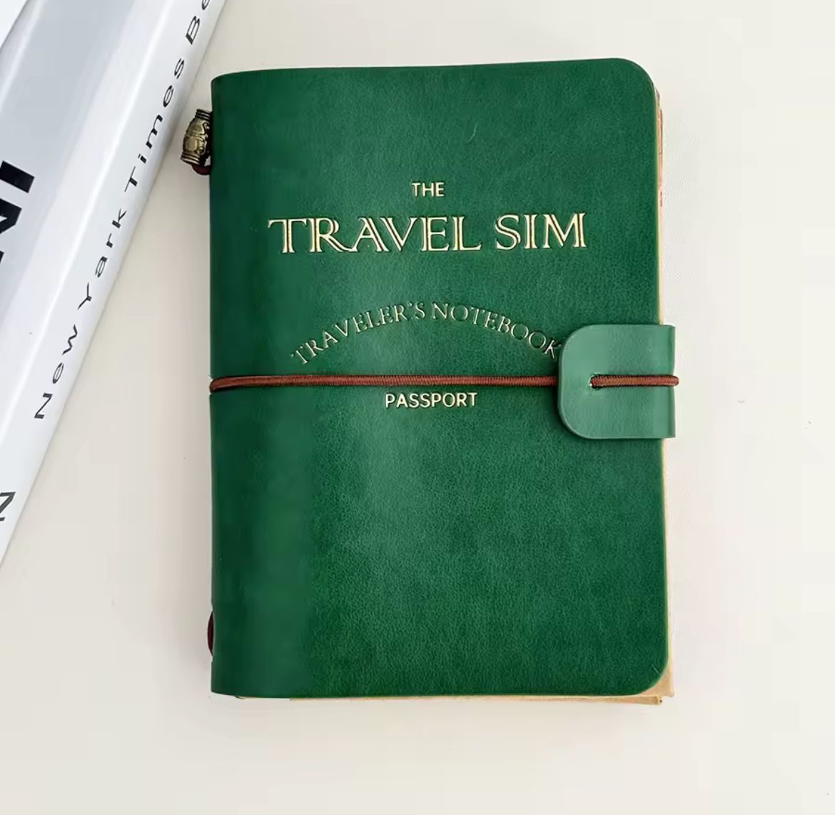Cuaderno de viaje tipo pasaporte – estilo vintage.